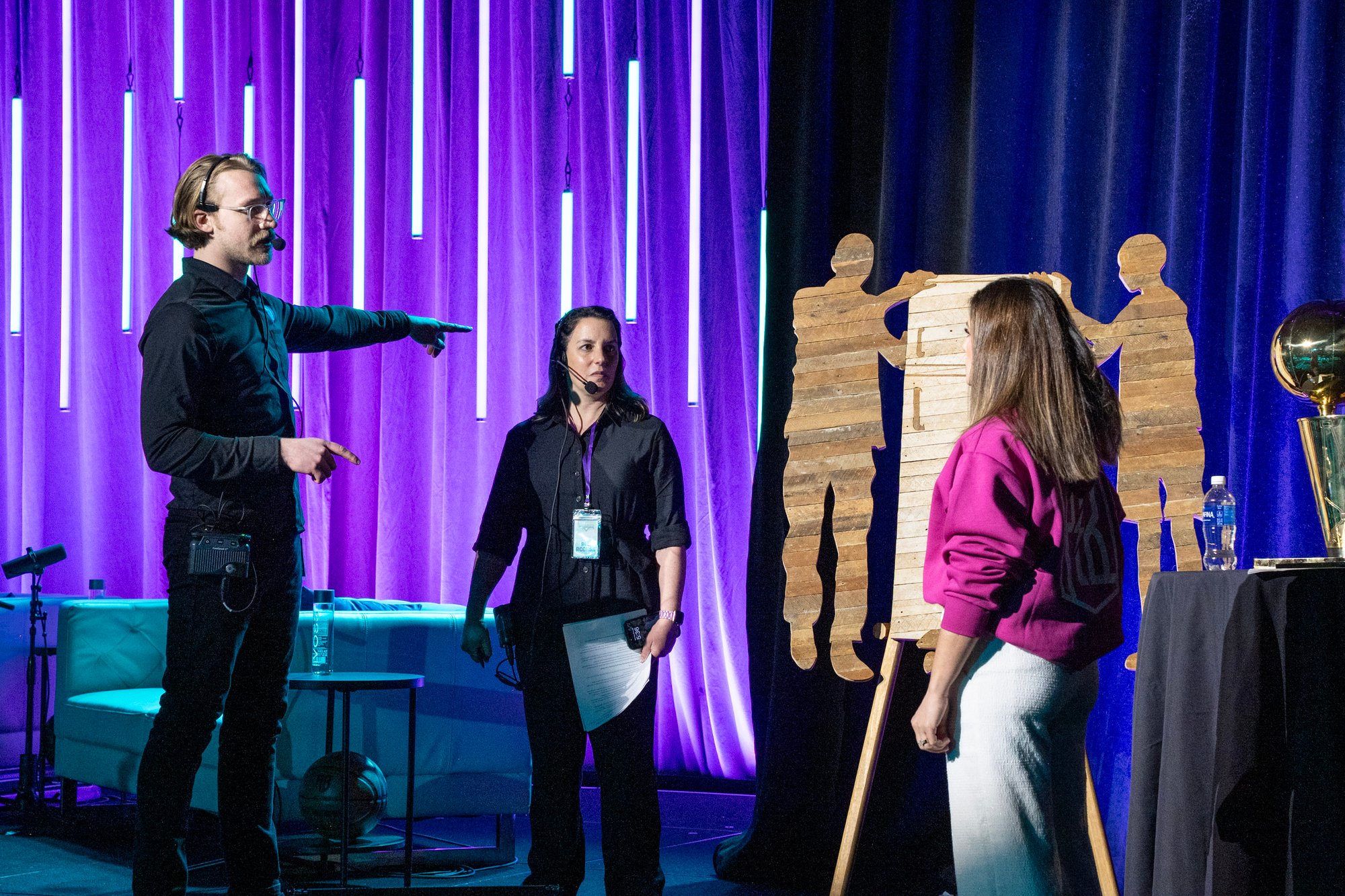 Event Producer managing live conference before the show begins